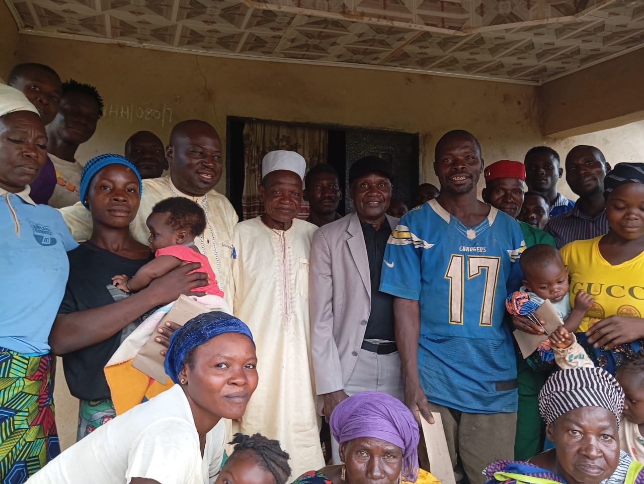 ISDDI Community Members gathered together showcasing unity and cultural heritage